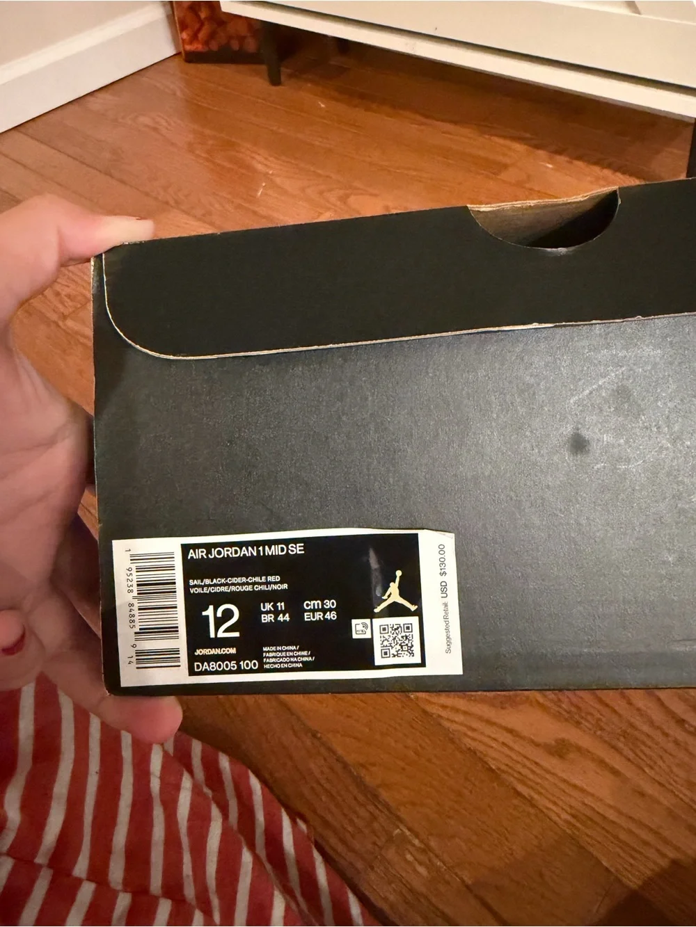 Jordan 1 Mid SE sneakers in sail/black-cider red.